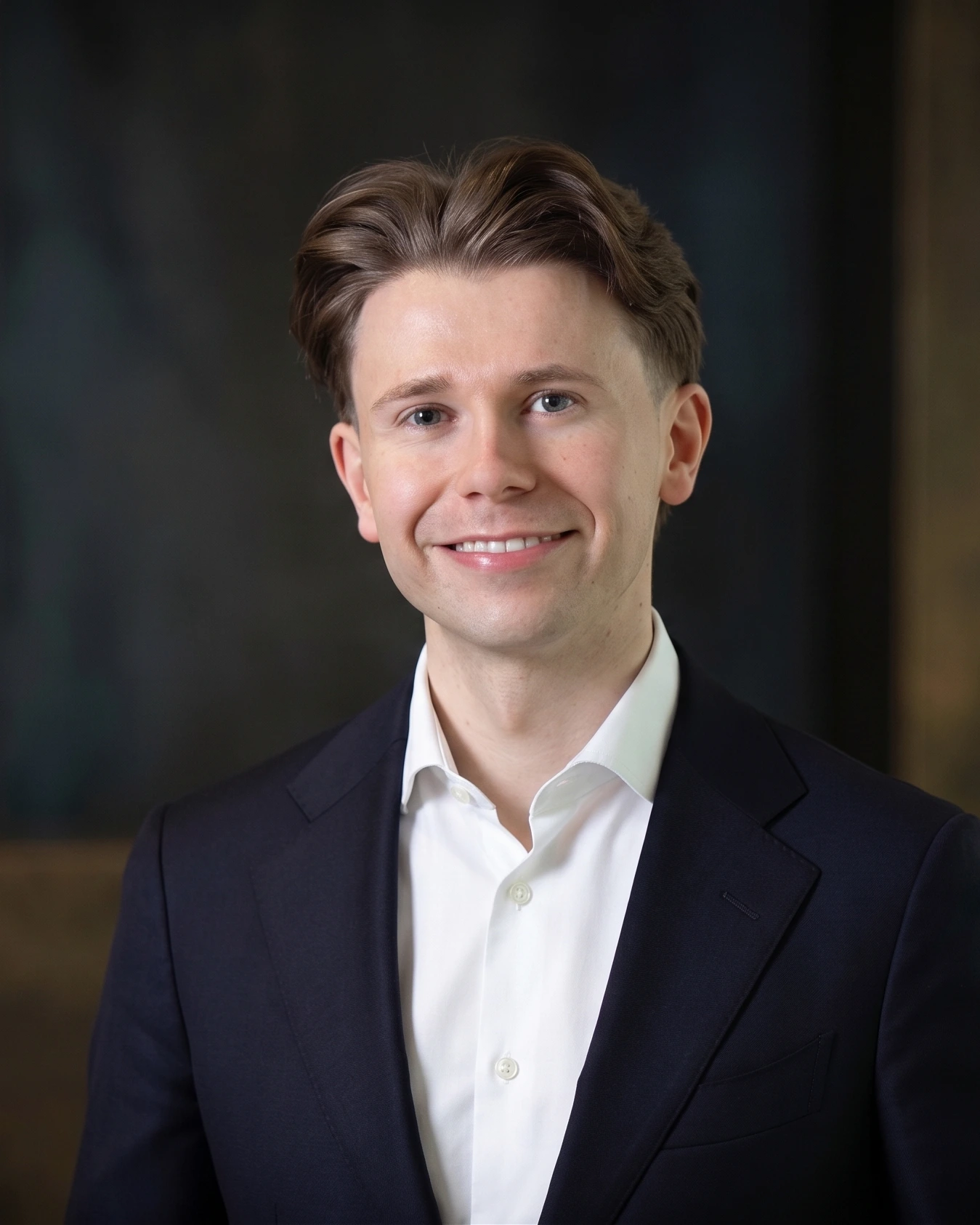 Dale McDermott in a dark blazer, photographed against a plain backdrop